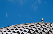 Workers on roof, Esplanade theatre. Singapore.
