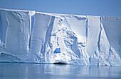 Face of the Ross ice shelf: this piece is about to fall off and also looks like a mans face frowning. Ross Sea, Antarctica
