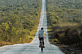 Cyclist. Tuléar, road 7, Antananarivo. Madagascar.