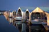 Boats and boat sheds at Van Isle Marina. Sidney, British Columbia. Canada