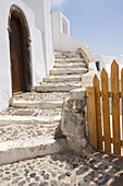 Winding staircase and fence. Santorini. Greece