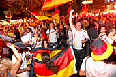 German soccer fans celebrating on the Kurfurstendamm, Berlin, Germany