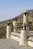 Typical roof with chimneys. Bubión, Alpujarras. Granada province, Andalusia, Spain