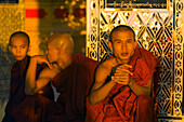 Monks outside the Su Taung Pyi Pagoda, Mandalay Hill, Mandalay, Myanmar (Burma)