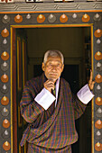Man in doorway, Paro, Bhutan