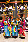 Musicians play horns, Paro Tsechu (festival), Paro Dzong, Paro, Bhutan
