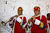 Musicians playing horns, Paro Tsechu (festival), Paro, Bhutan