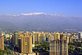 View of buildings (with Los Angeles Mountain, Andes Mountains) in the Los Condes section of Santiago, Chile