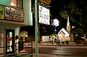 Las Vegas Boulevard, The Strip. Graceland Wedding Chapel and Jail Busters, downtown Las Vegas, Nevada, USA