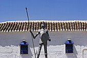 Statue of Don Quixote in front of the Venta de Don Quijote (Inn of Don Quixote), Puerto Lápice. Ciudad Real province, Castilla-La Mancha, Spain