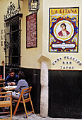 Casa Placido. Portrait of gypsy woman in porcelaine tile. Sevilla. Andalucia. Spain