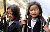 Black Hmong girls in Sa Pa outlying area. Vietnam