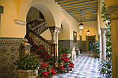 Typical courtyard at Santa Cruz district. Sevilla. Andalusia. Spain.