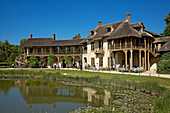 Petit hameau, hamlet of Marie Antoinette in a part of the Versailles Park, Versailles. Yvelines, Île-de-France, France