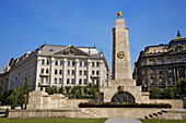 Szabadság Tér, bank and Monument to Communism. Budapest. Hungary.