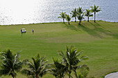 Malaysian golf course situated by sea, aerial view