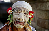 Traditional Balinese dancers backstage, wearing costumes and make up. Bali. Indonesia.