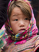 Flower Hmong girl surprised by the camera. Taken at market in Bac Ha, Lao Cai province, Northern Vietnam (april, 2006)