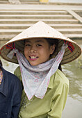 A curious young girl on the floating island of Kenh Ga. Ninh Binh, Vietnam (may 2006)