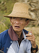 old man smoking, Dali, China