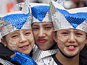 glitter trio.  3 gals with painted faces performing at the annual Sinulog Festival, Cebu, Philippines