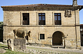 Monument to the Altamira man and town hall. Santillana del Mar, Cantabria, Spain.