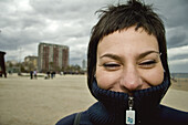 Woman smiling. Barceloneta. Barcelona. Catalonia. Spain.