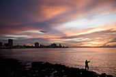 Men fishing under the Malecon. Havana. Cuba