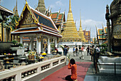 Tourists in Wat Phra Keo, Temple of the Emerald Buddha, Bangkok, Thailand
