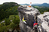 Climbers on rock, Papststein, Saxon Switzerland, Saxony, Germany