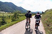 Two cyclists, Wosendorf, Weissenkirchen, Lower Austria, Austria