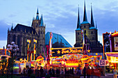 Europe, Germany, Thuringia, Erfurt. Spring festival at the Domplatz with Mariendom and Severikirche in the backgroud