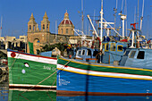 Marsaxlokk harbour and luzzu boats. Malta