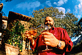 Pat Kuleto (Famous restaurants owner in San Francisco) sampling his white wine. Napa Valley. California. USA