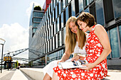 Two young german women at Cologne, North Rhine-Westphalia, Germany