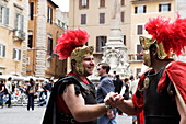 Two men wearing uniforms of Roman legionaries, Piazza del Rotonda, Rome, Italy