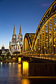 Cologne Cathedral and Hohenzollern Bridge at night, Cologne, North Rhine-Westphalia, Germany