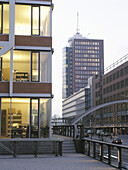 Office building in the HafenCity, Hanseatic Trade Center in background, Hamburg, Germany