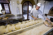 Montegemoli. 'Forno di Montegemoli' Fratelli Martini Bakery. Making the Montegemoli bread in wood-burning oven. Volterra. Tuscany. Italy.