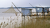 Carrelet' (small fishing huts) on the estuary of the Gironde. Gironde. France.