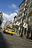Taxi cab in Greene Street, Soho, Manhattan, NYC, USA