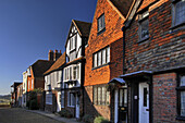 street scene showing old medieval buildings in historic five cinque port Rye East Sussex england uk europe