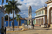 Plaza Mayor (Main Square), and the tower of  Museo Nacional de la Lucha Contra Bandidos (bandits museum, former church of San Francisco de Asís)., Trinidad city, Sancti Spiritus Province, Cuba