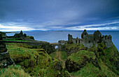 The ruins of Dunluce Castle on shore, County Antrim, Ireland, Europe