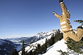 Boy in mid-air, See, Tyrol, Austria