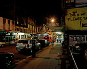 People and cars at creative quarter Cuba Street at night, Wellington, North Island, New Zealand