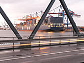 Cargo ship in container port, Hamburg, Germany