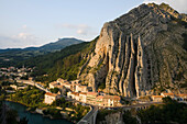 View at the town Sisteron between the river Durance and high limestone cliffs, Alpes-de-Haute-Provence, Provence, France