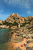 Italy Sardinia Capo Testa Cala Spinosa, sand beach with cristal clear water surrounded by bizarre rocks