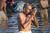 Man praying, Allahabad. Uttar Pradesh, India